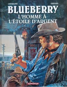 Couverture de l'album L'Homme à l'Etoile d'Argent